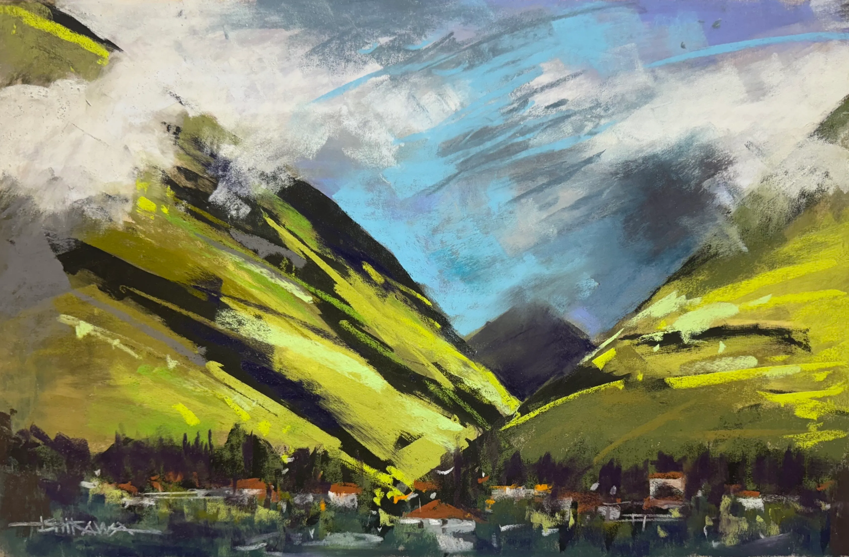 the mountains of Maui rise spectcularly from the landscape